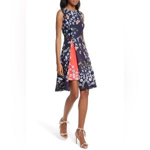 JENNESA KYOTO GARDENS FAUX WRAP DRESS IN MID BLUE. NWOT. Size 0